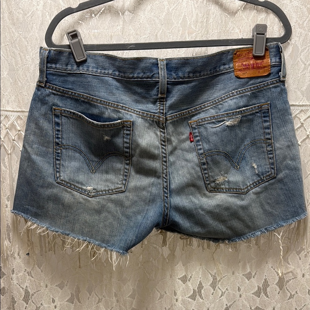 Vintage distressed Levi denim shorts